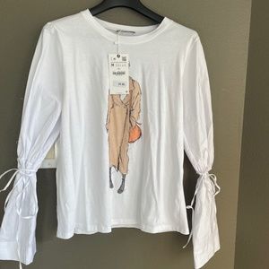 Combination tee with tie detail at the wrist